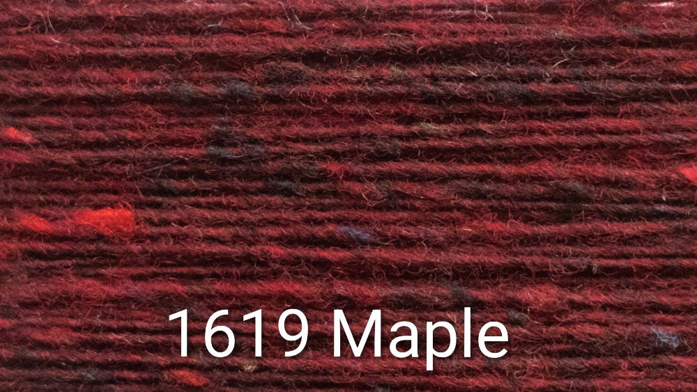 Close-up of a tweed yarn in a deep burgundy red color, with the text '1619 Maple' overlaid at the bottom.